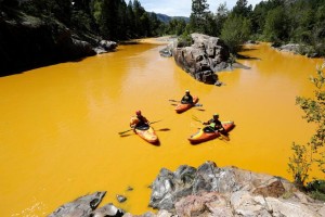 3 kayakers on Animas